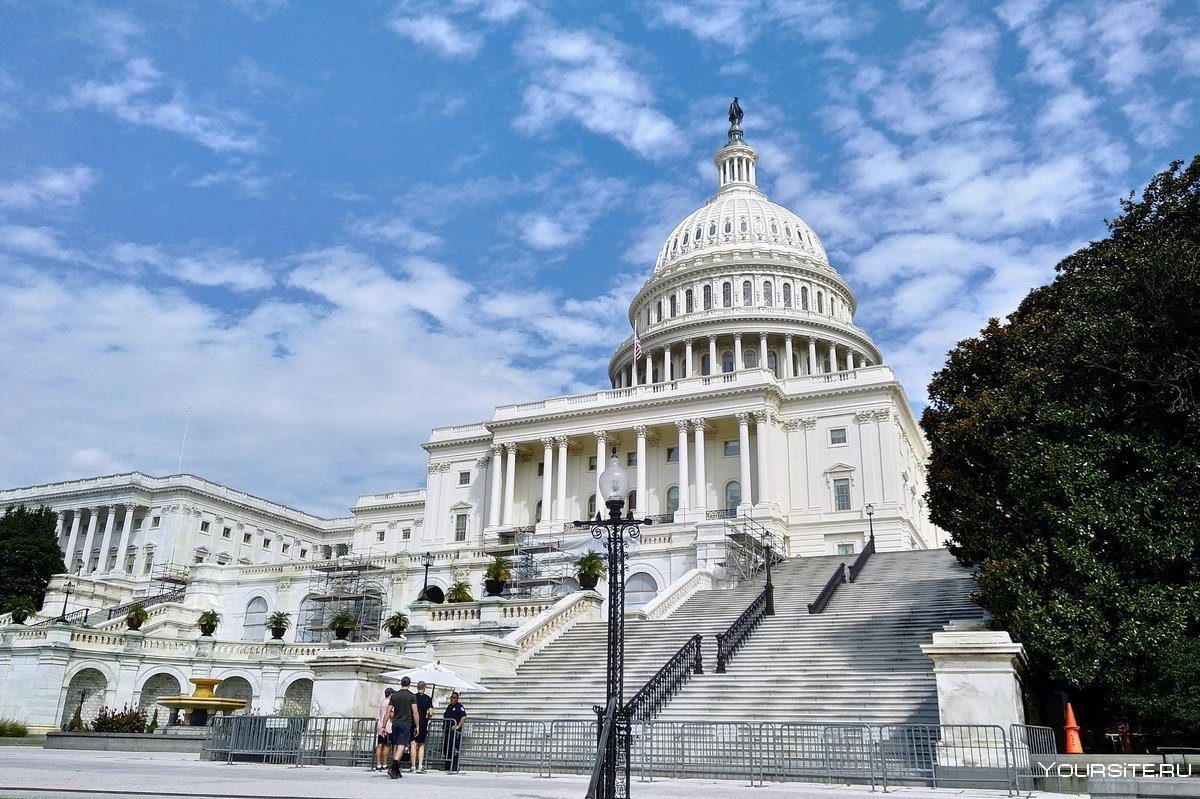 A photorealistic image of the United States Capitol Building in Washington, D.C., on a sunny day. The federal real estate laws are discussed here in the final instance.